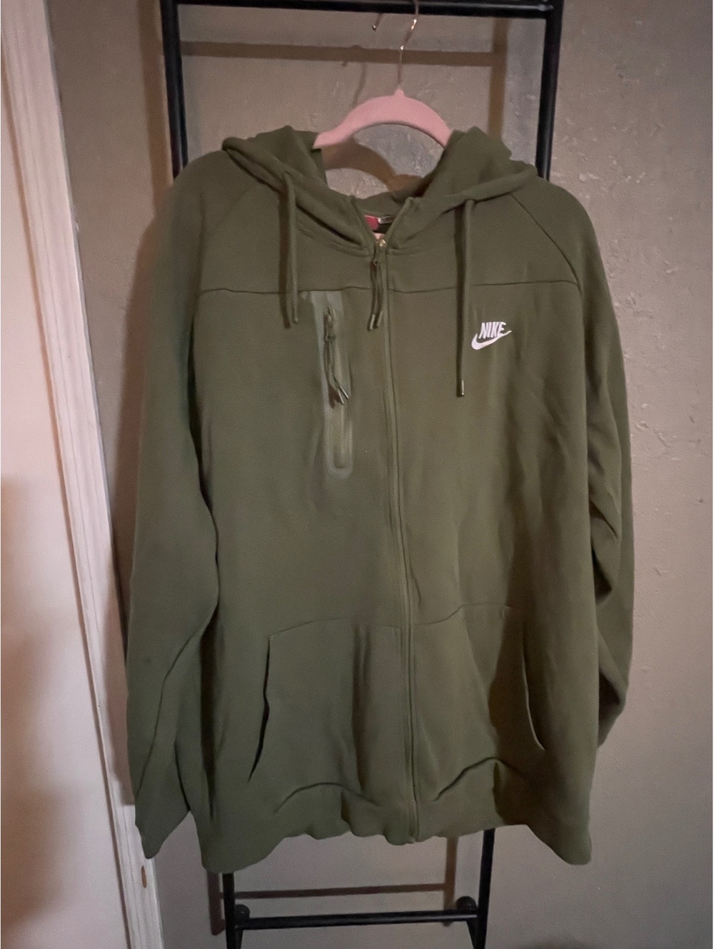 Nike Tech Fleece full-zip hoodie in an olive/army green colorway.
